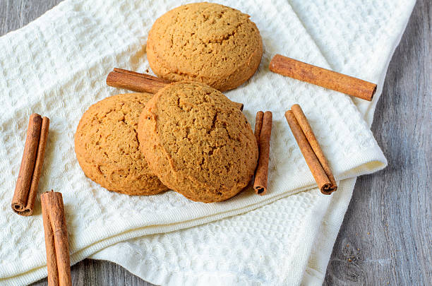 istock Oatmeal cookies and cinnamon sticks 482250636