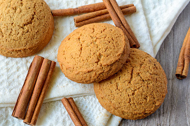 Oatmeal cookies and cinnamon sticks