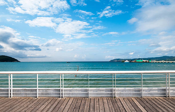 istock the sea and green hills. 482253496
