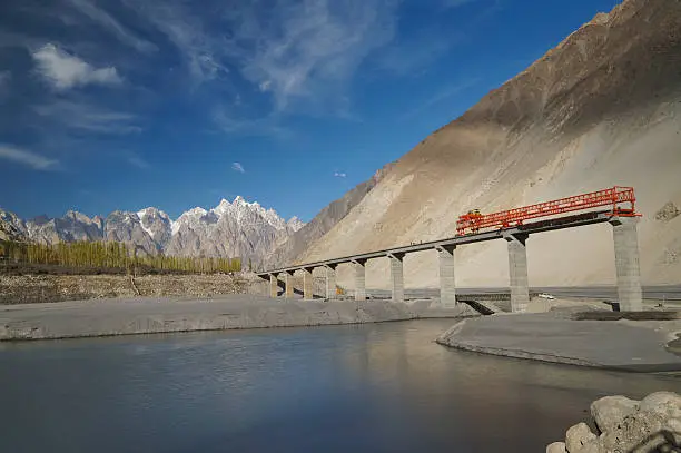 Bridge construction across the Indus River along the Karakorum Highway in Pakistan.