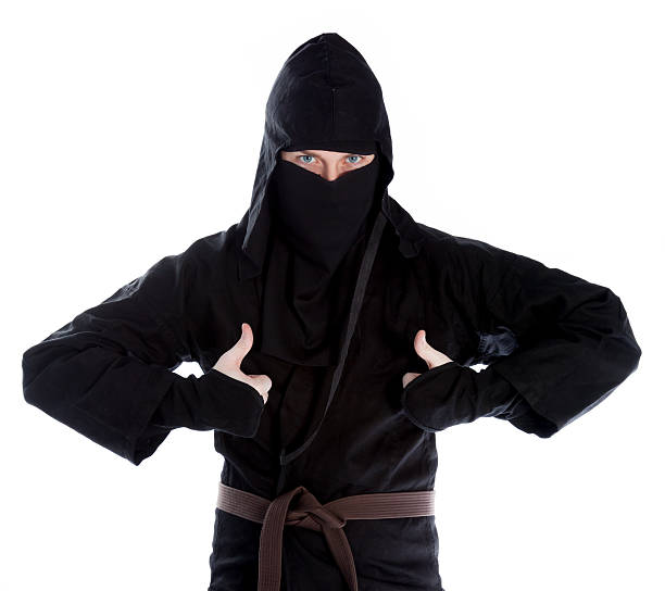 istock caucasian man disguised as a ninja isolated on white 482258547