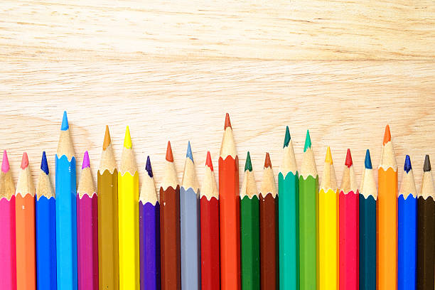 istock Color pencils on wood background 482260682