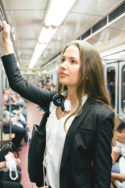istock Beautiful Woman On Subway Train 482263526