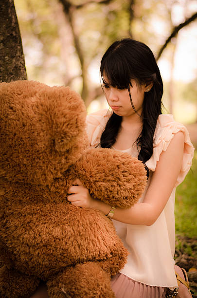 istock girl with the bear 482264781