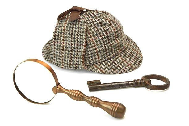 istock Detective Concept, Deerstalker Cap, Vintage Magnifying Glass And Key 482266576