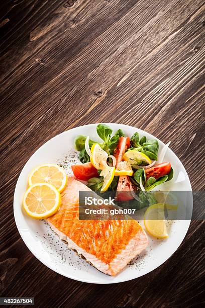 Grilled Salmon And Vegetables Stock Photo - Download Image Now - 2015, Baked Salmon, Basil