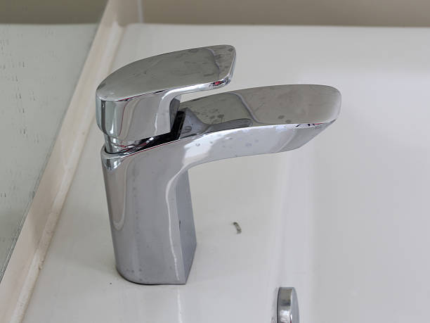 istock close up of Modern bathroom faucet 482268272