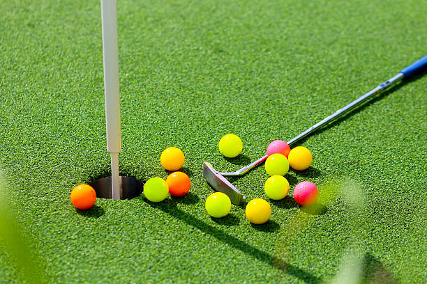 istock Close-up of miniature golf hole with bat and ball 482271480