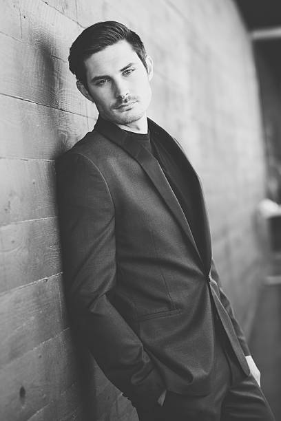 istock Attractive young businessman in urban background 482271522