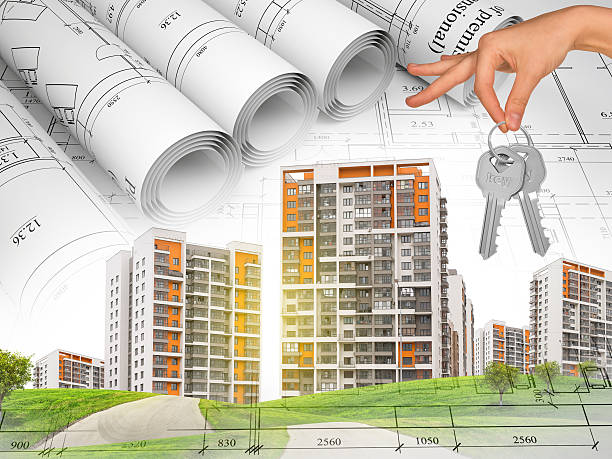 istock Cityscape and hand with keys 482272872