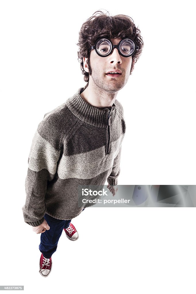Goofy student an handsome guy, maybe a student, in casual clothing with thick glasses and a nerdy look. isolated on white Eyeglasses Stock Photo