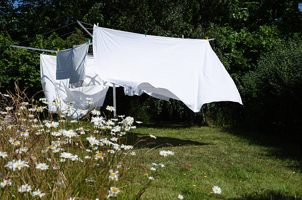 Drying white sheets stock photo