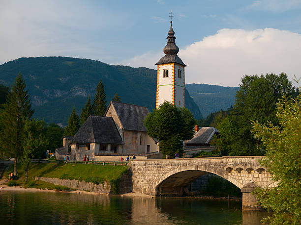 istock Church tower and stone bridge at Lake Bohinj 482276662