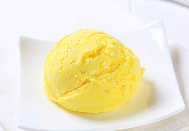 istock Scoops of yellow ice cream 482277036