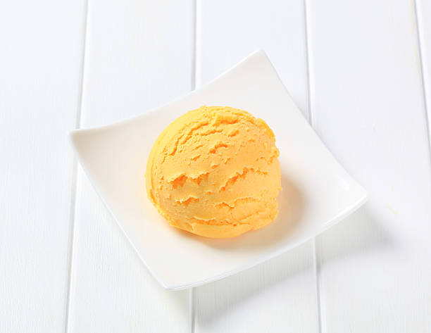 istock Scoop of orange ice cream 482277114