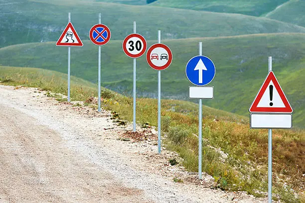 Photo of Six Road Signs near Castelluccio, Umbria, Italy