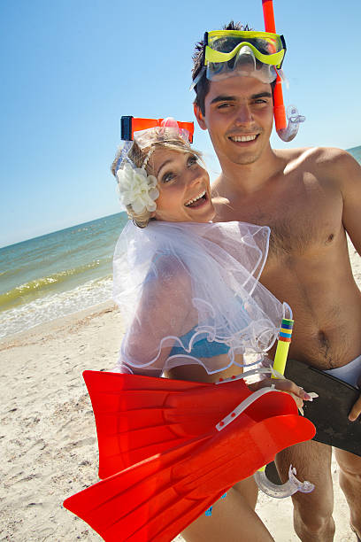 istock Couple having fun on the beach 482279735