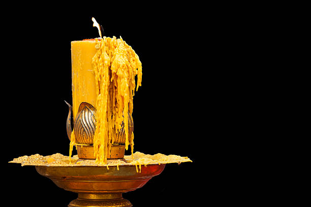 istock burning of candle on candlestick 482280820