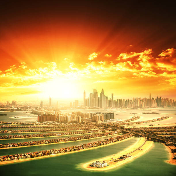 sunrise over the palm jumeirah in Dubai with skyline