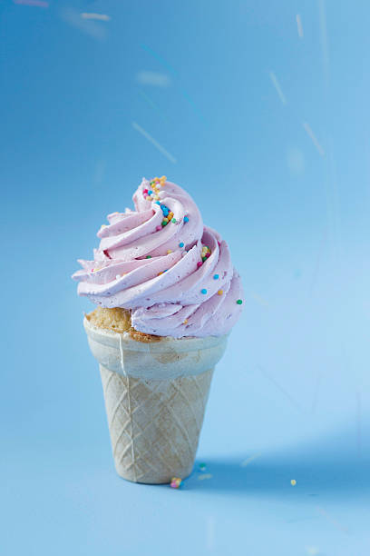 istock Cupcake in an ice-cream cone - perfect summer party dessert 482282034
