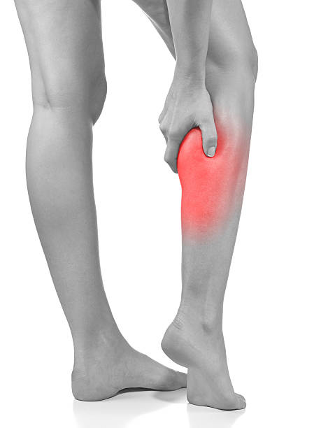 istock Woman massaging her painful leg calf. 482282110