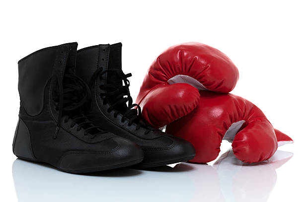 istock Boxing gloves and shoes isolated on white 482284832