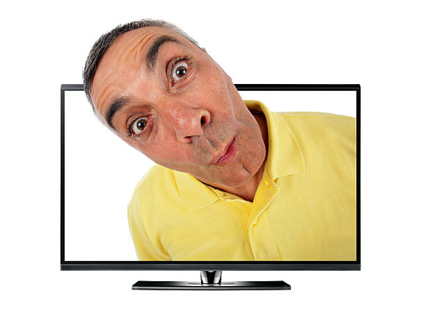 Surprised man with television and WOW expression. Surprised man with television and WOW expression on white backgound. coming out of computer screen stock pictures, royalty-free photos & images