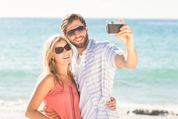 istock Happy couple taking selfie 482291488