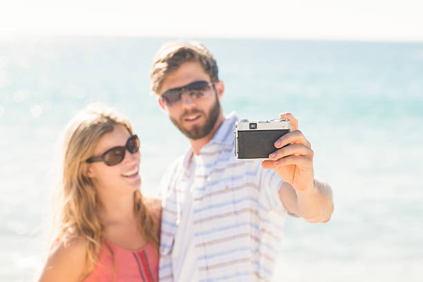 istock Happy couple taking selfie 482291508