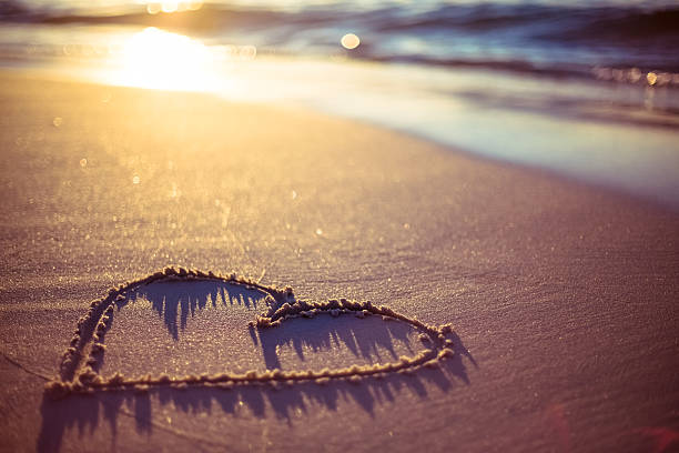 istock one heart drawn in the sand 482292310