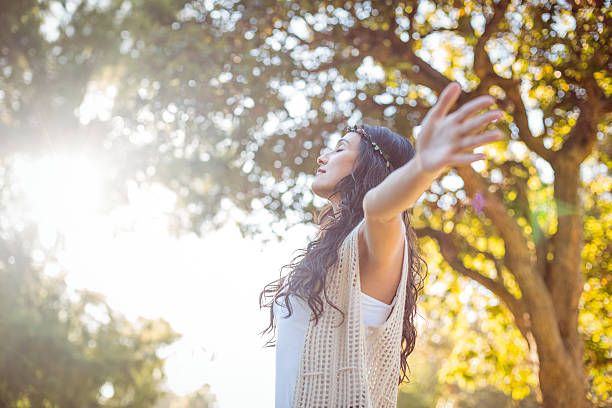 istock Pretty hipster felling free in the park 482299676
