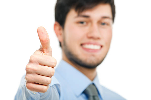 istock Smiling business man thumbs up 482303401