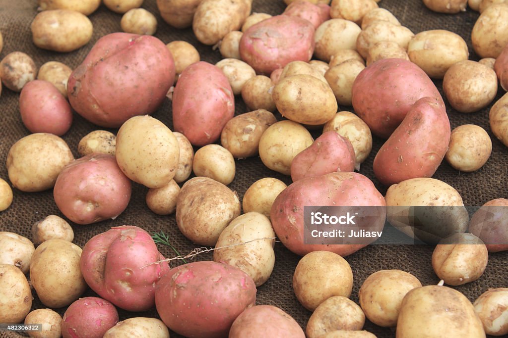 potatoes raw vegetables food on sacking potatoes raw vegetables food on sacking for pattern texture and background 2015 Stock Photo