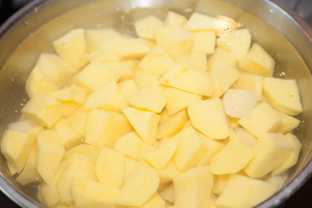 istock potatoes cut in pieces in water 482306846