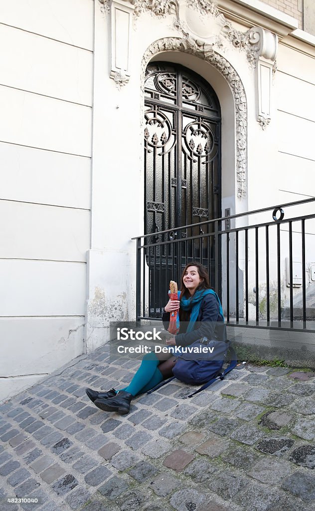 Beautiful girl on the Montmartre, in Paris Beautiful girl on the Montmartre, in Paris France Eating Stock Photo