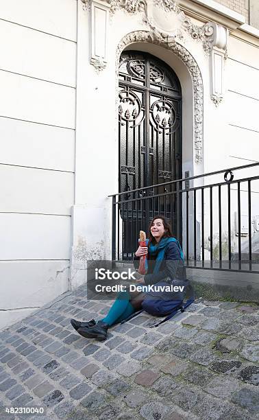 Beautiful Girl On The Montmartre In Paris Stock Photo - Download Image Now - Eating, Outdoors, University