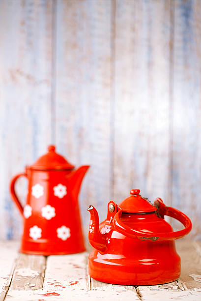 istock Red and white Enamel Tea Coffee Pots on wood 482321692