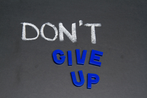 DON'T GIVE UP Concept on Blackboard