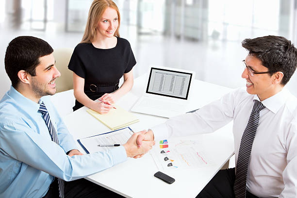 istock Friendly handshake business people 482325954