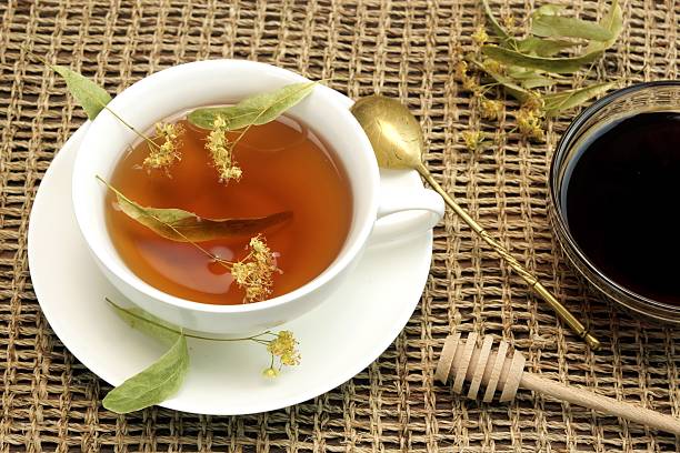 istock Tea Cup With Herbal Tea And  Honey On The Tabletop 482328284