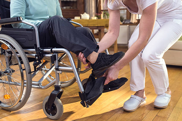 istock Nurse during home visit with senior woman 482329106