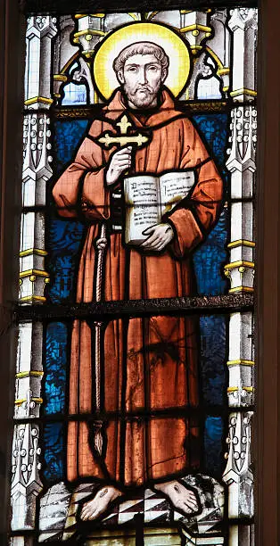 Stained glass window depicting Saint Francis of Assisi in the Church of Stabroek, Belgium.