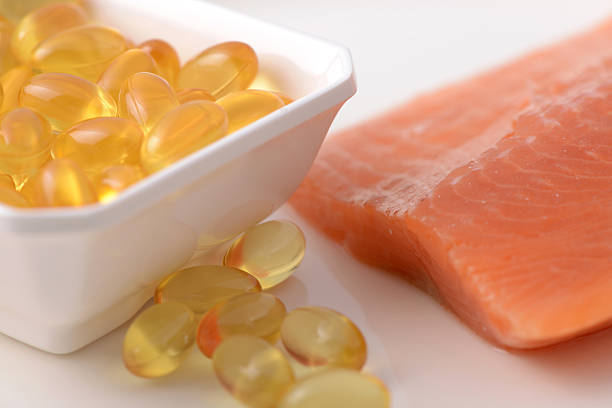 istock Fish oil and salmon fillet slice 482333470