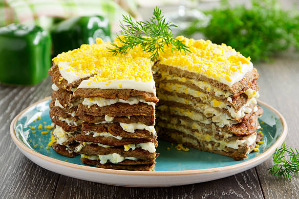 istock Cake pancakes from the liver with eggs and greens. 482334315