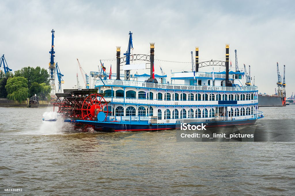 paddle steamer at harbor Hamburg paddle steamer at harbor Hamburg in Germany. Paddleboat Stock Photo