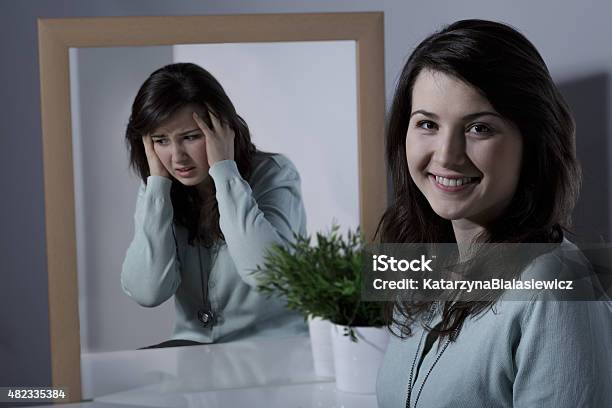 Girl And Bipolar Disorder Stock Photo - Download Image Now - Bipolar Disorder, Chaos, Mirror - Object