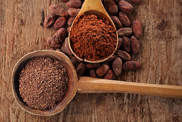 istock grated dark chocolate in old wooden spoon on roasted cocoa 482335404