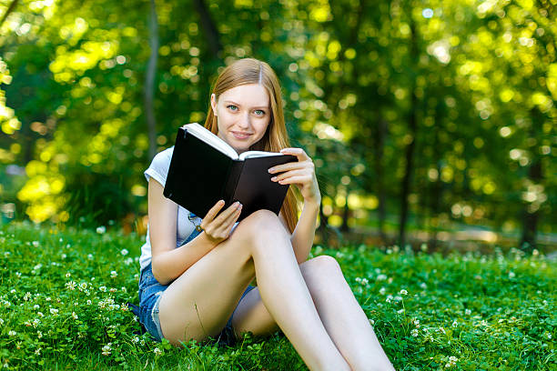 istock Beautiful smiling red-haired young woman 482335602