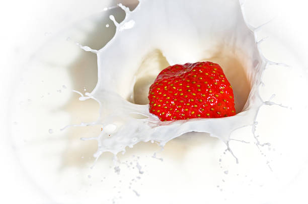 istock The strawberry falling in milk 482337560
