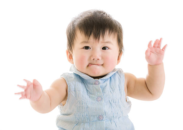 Little girl with hands up